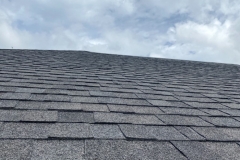 new-shingled-roof-with-blue-sky